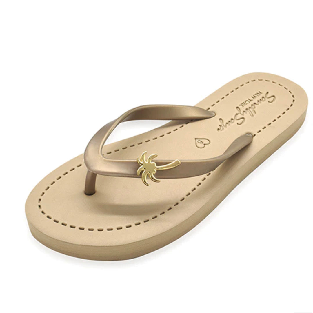 Gold flip flops with gold palm tree studs