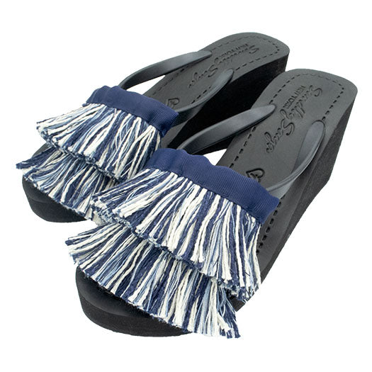 White and blue tussle sandal