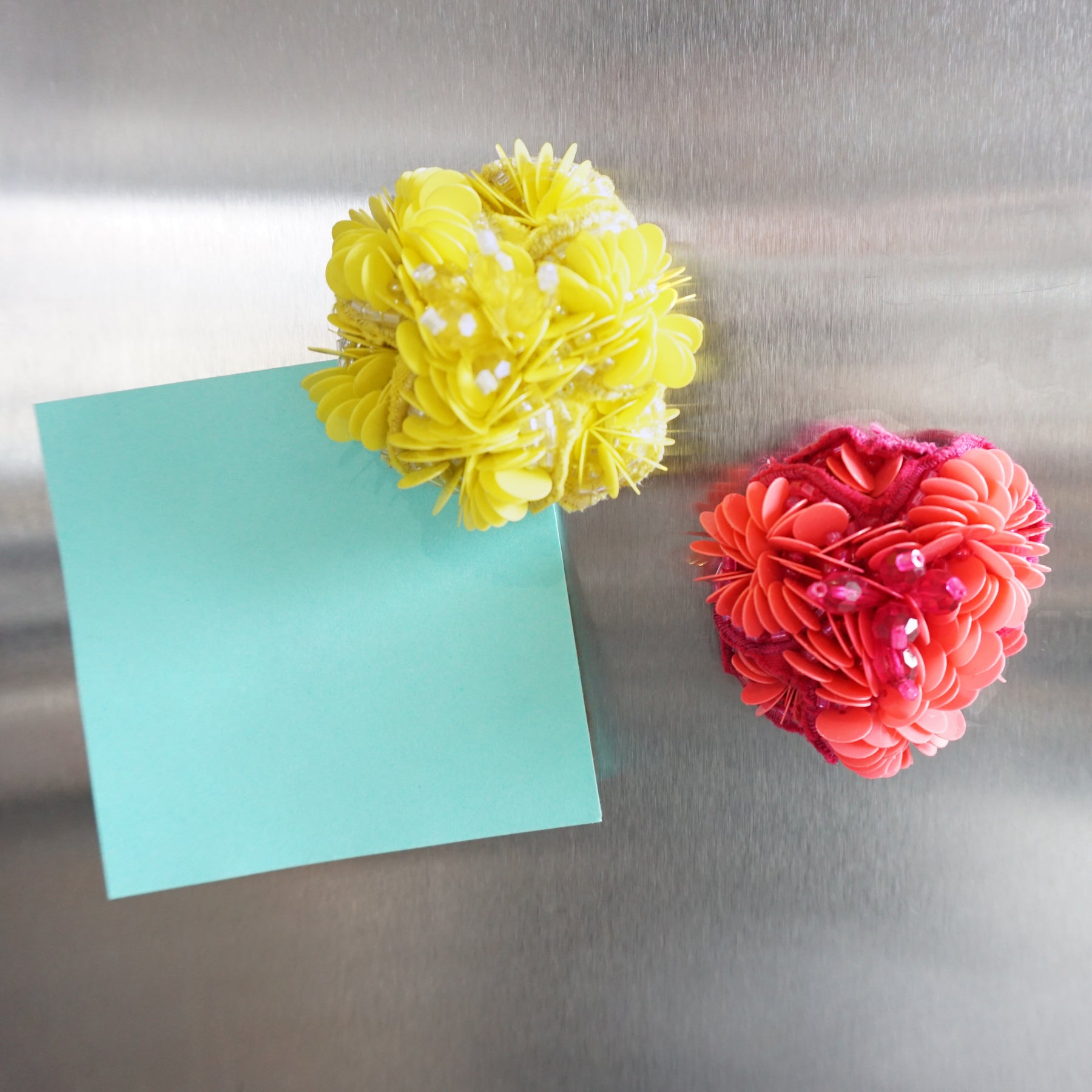 Yellow pink flower magnets